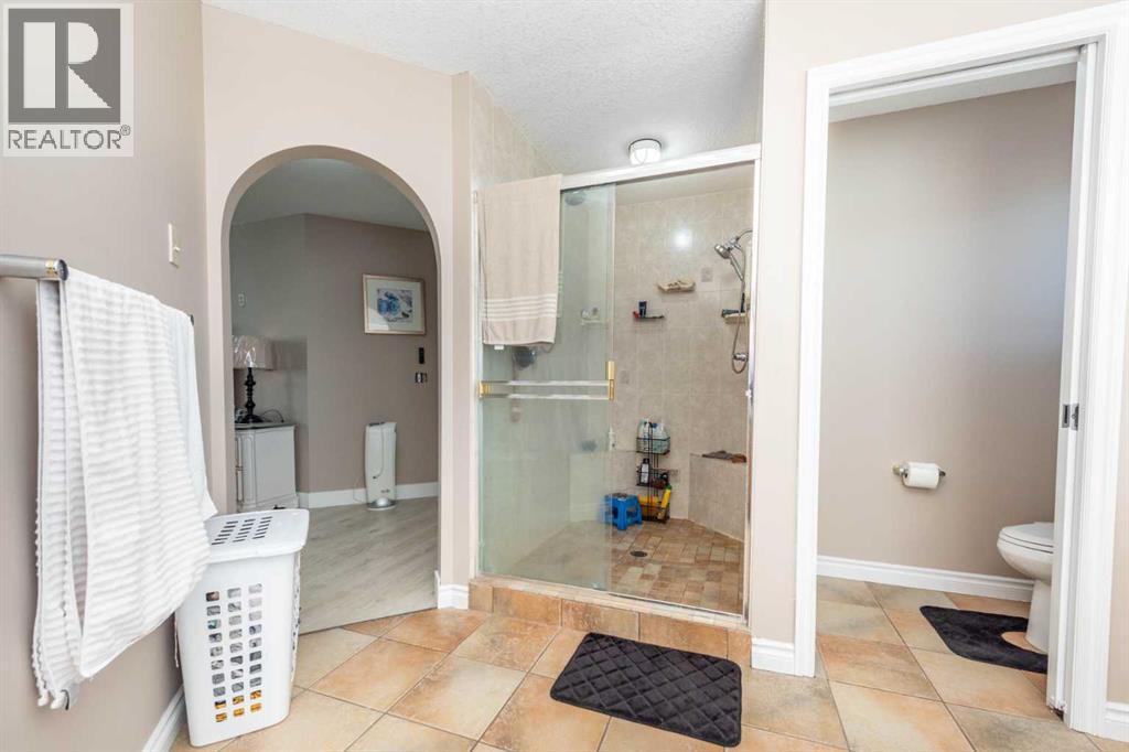 263140 Butte Hills Way, Rural Rocky View County, Alberta  T4A 0P6 - Photo 34 - A2268045