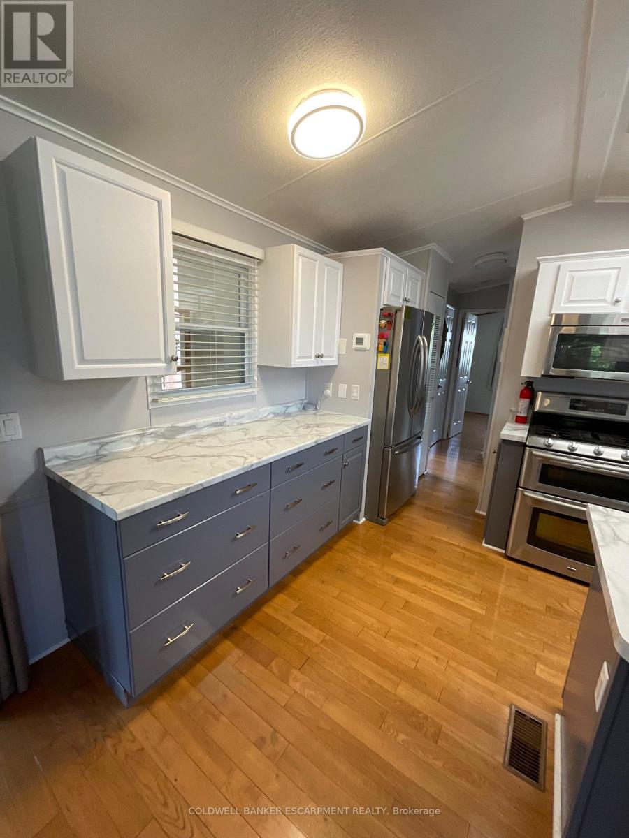 5 Spruce - 4449 Milburough Line, Burlington, Ontario  L7P 0P5 - Photo 5 - W12449663