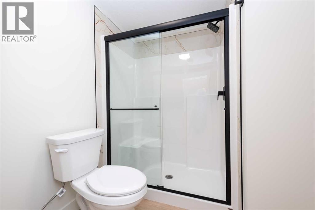 77 Waterford Crescent, Chestermere, Alberta  T1X 3A2 - Photo 45 - A2263792