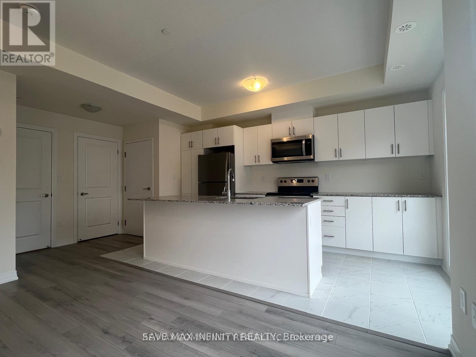 08 - 165 Tapscott Road, Toronto, Ontario  M1B 0E8 - Photo 4 - E12500902