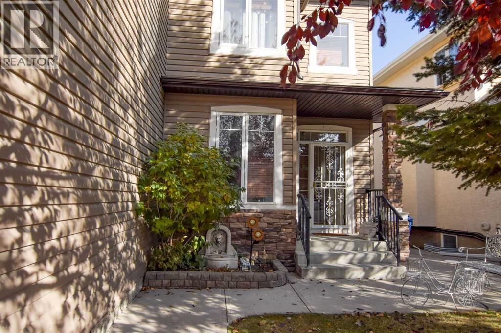 107 Panatella Close Nw, Calgary, Alberta  T3K 0N2 - Photo 2 - A2265413