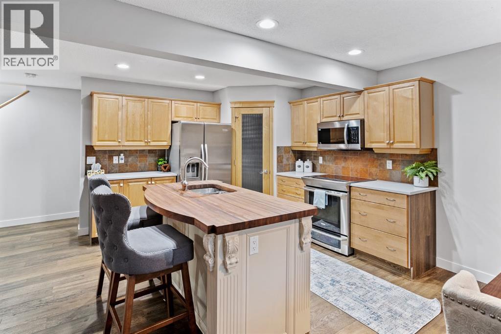 47 Sunset Circle, Cochrane, Alberta  T4C 0C3 - Photo 4 - A2255094