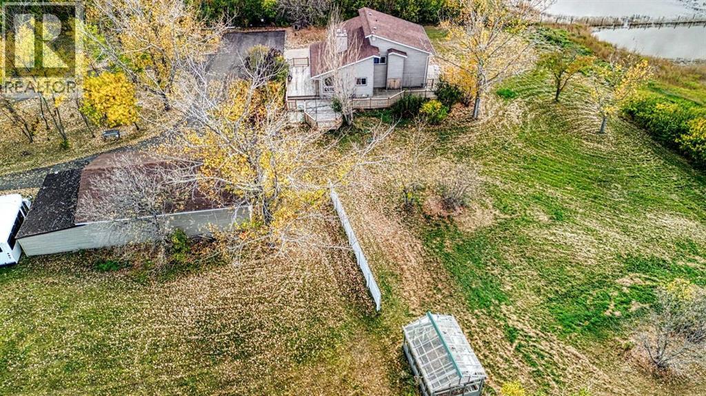 247 Shore Drive, Rural Rocky View County, Alberta  T2M 4L5 - Photo 46 - A2262909