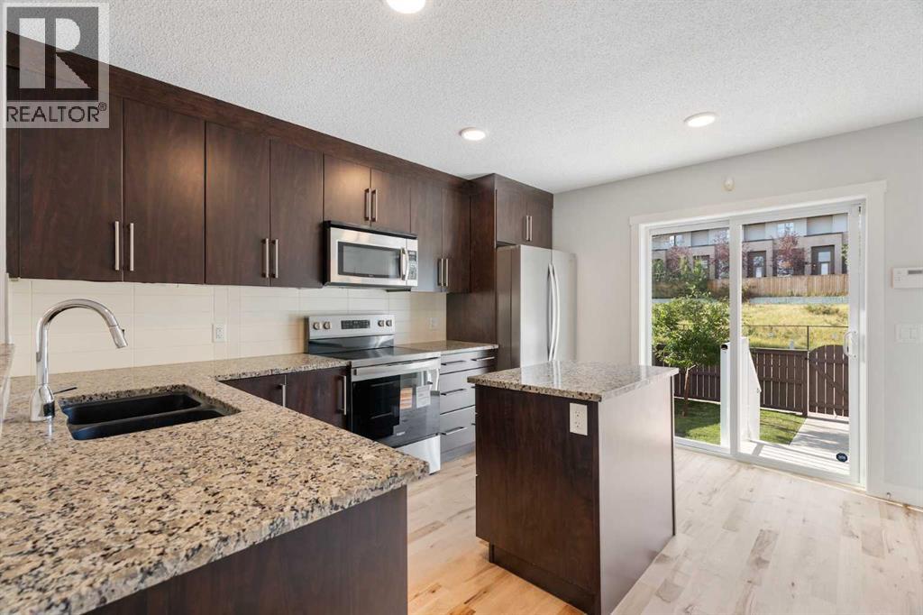 119 Aspen Hills Drive Sw, Calgary, Alberta  T3H 0P9 - Photo 13 - A2255737