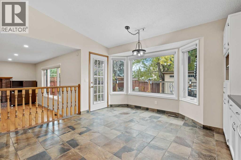 667 Macewan Drive Nw, Calgary, Alberta  T3K 3R3 - Photo 11 - A2267646