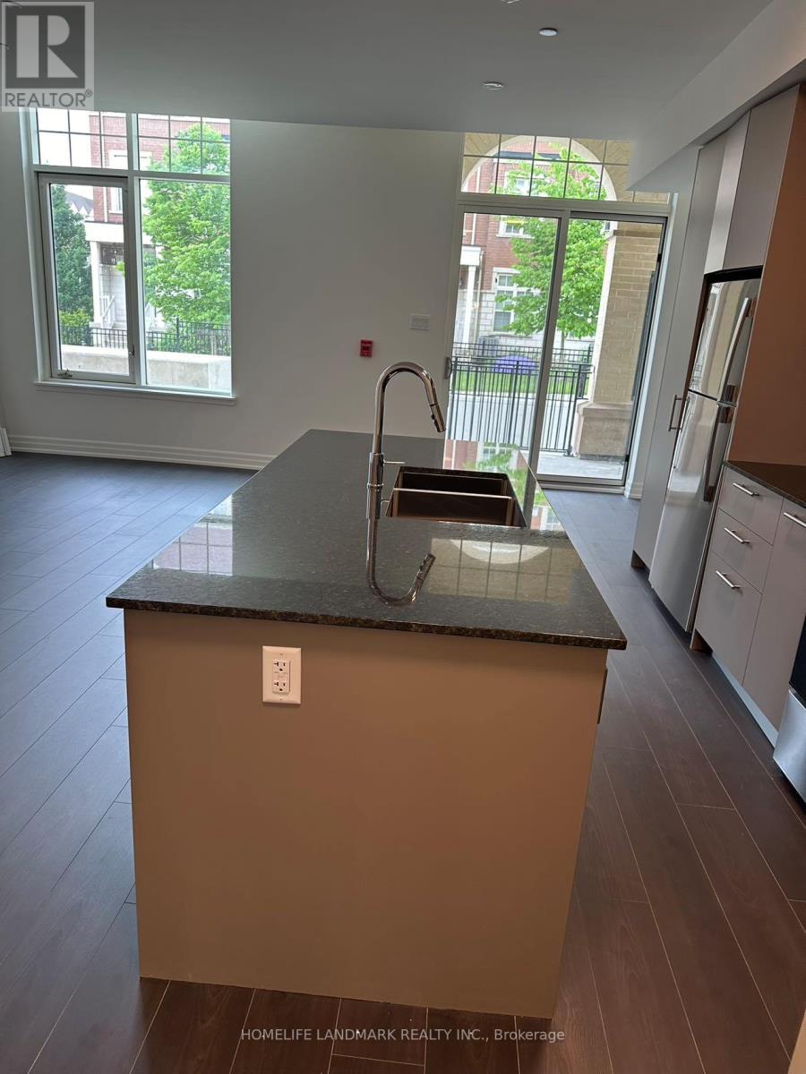 106 - 101 Cathedral High Street, Markham, Ontario  L6C 0P1 - Photo 3 - N12501160