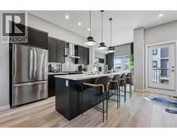 112, 595 Mahogany Road SE Mahogany