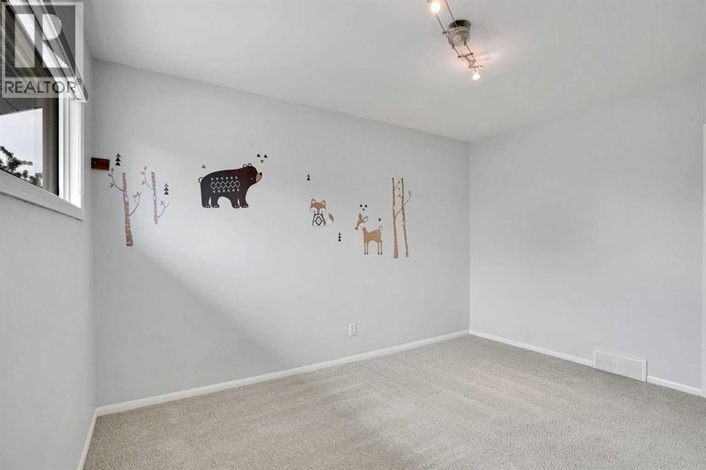 88 Westwood Drive Sw, Calgary, Alberta  T3C 2V7 - Photo 25 - A2257438