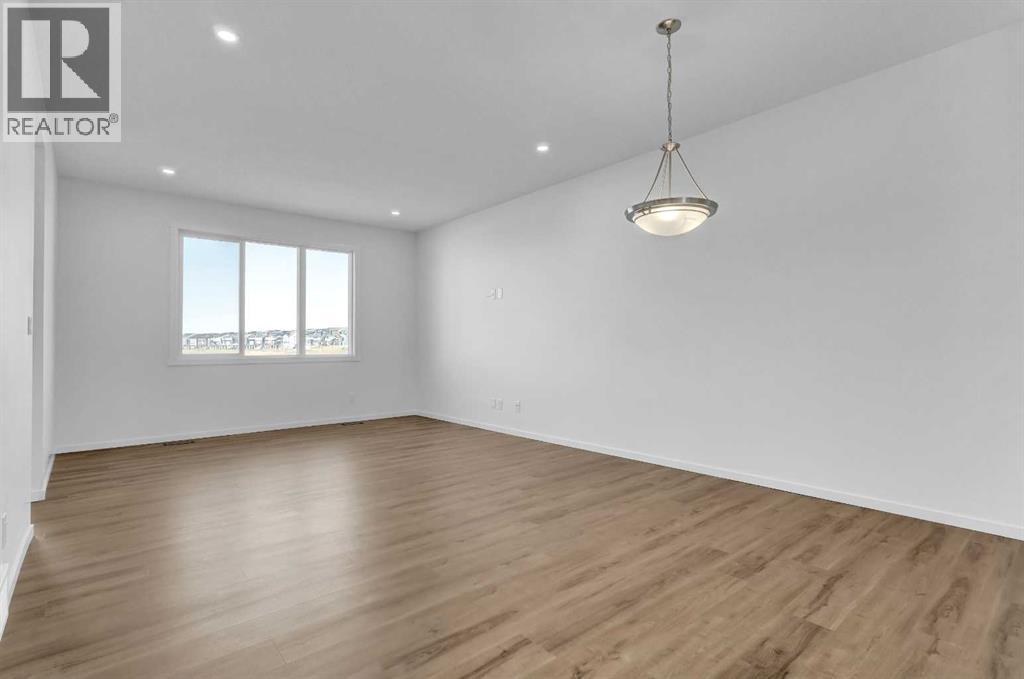 71 Carringford Road Nw, Calgary, Alberta  T3P 2H1 - Photo 5 - A2258881