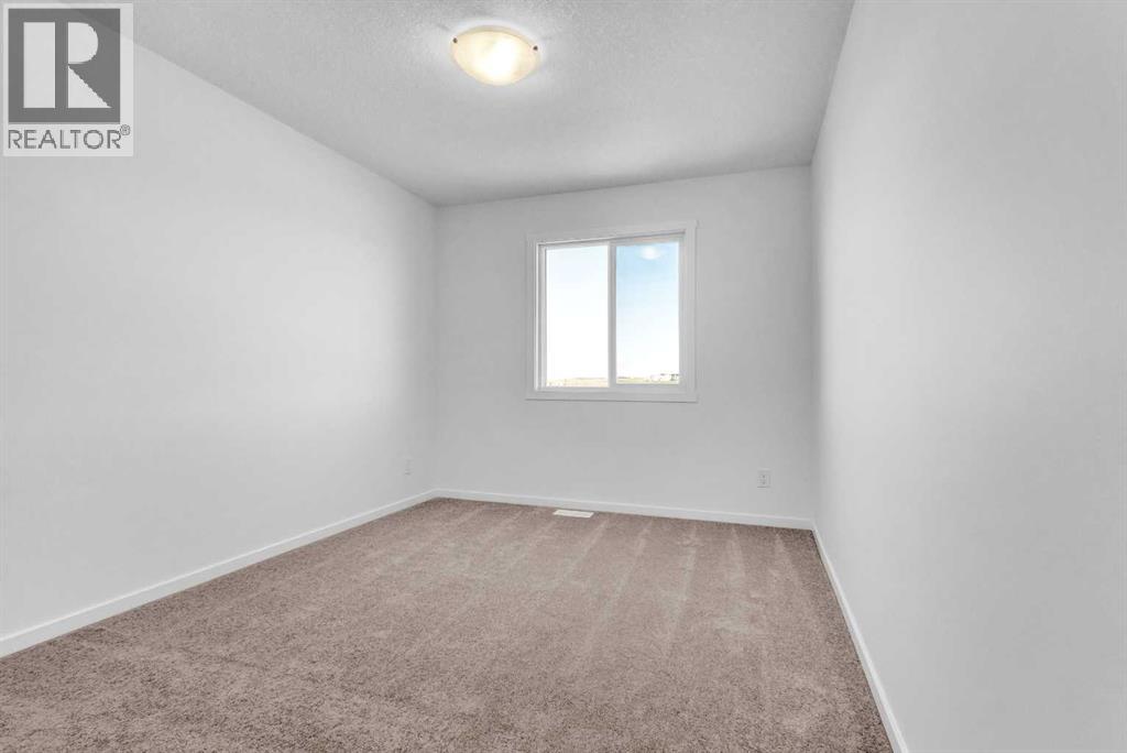 71 Carringford Road Nw, Calgary, Alberta  T3P 2H1 - Photo 24 - A2258881