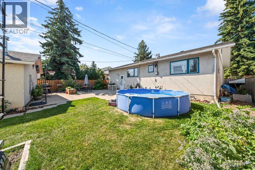 102 Marbrooke Circle Ne, Calgary, Alberta T2A 2W6 - Photo 32 - A2251892