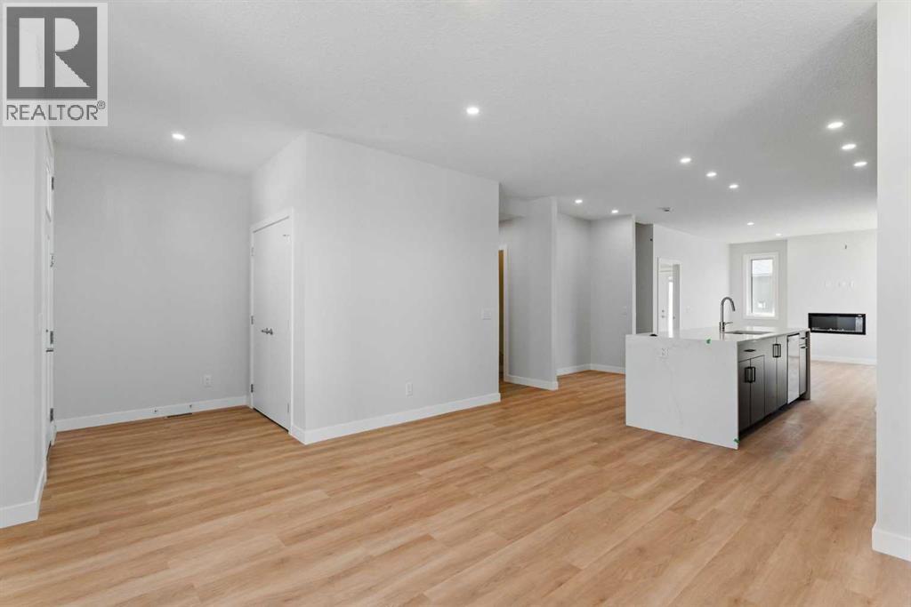 1125 Harmony Heath, Rural Rocky View County, Alberta  T3G 0J6 - Photo 8 - A2257418