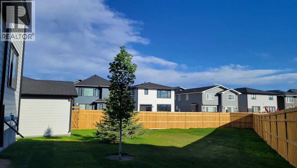 1125 Harmony Heath, Rural Rocky View County, Alberta  T3G 0J6 - Photo 3 - A2257418