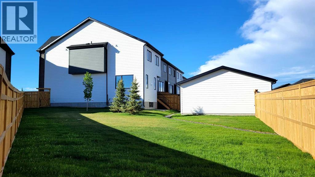 1125 Harmony Heath, Rural Rocky View County, Alberta  T3G 0J6 - Photo 4 - A2257418