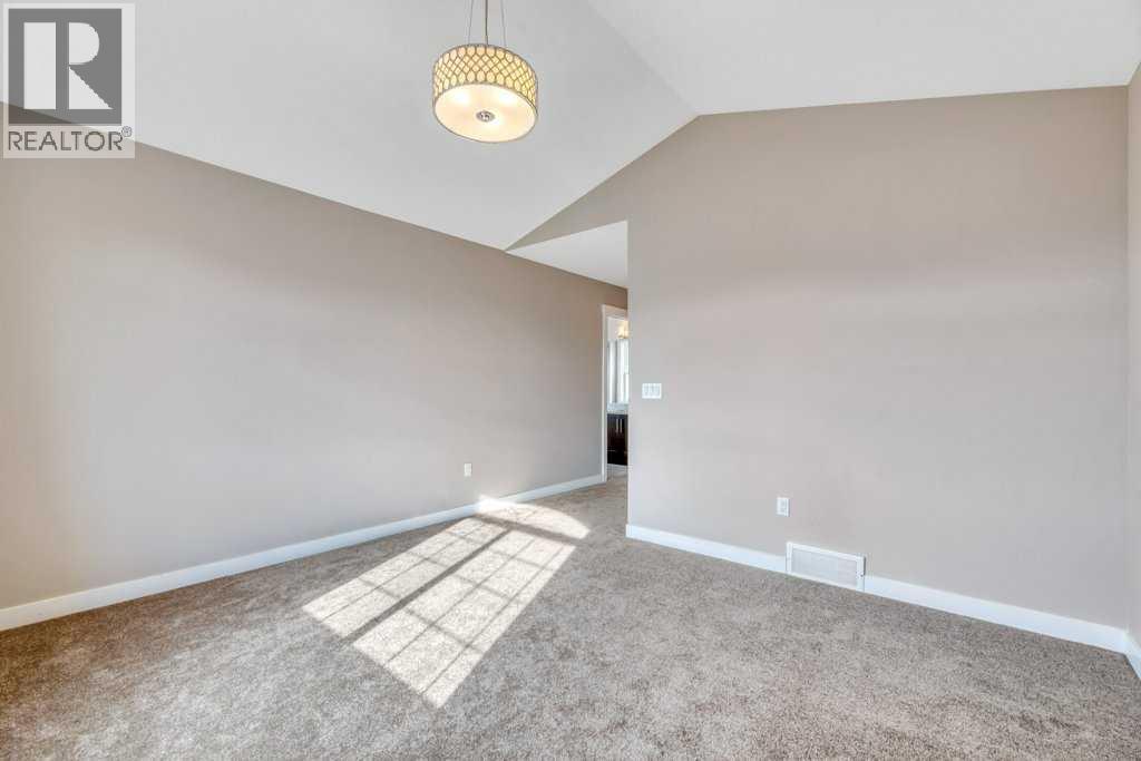 2450 Baysprings Link Sw, Airdrie, Alberta  T4B 3V2 - Photo 25 - A2266469