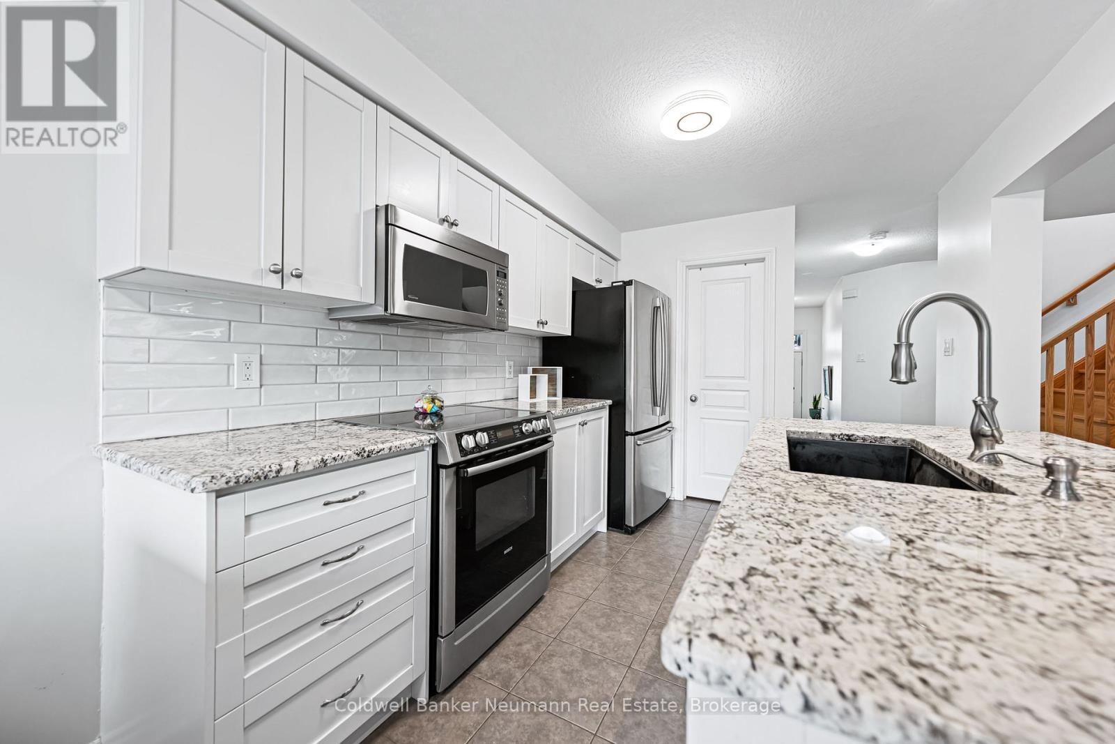 212 Goodwin Drive, Guelph, Ontario  N1L 0C8 - Photo 12 - X12502082