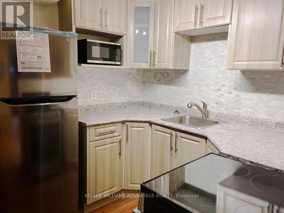 2 Edgewood Gardens, Toronto, Ontario  M4L 3H5 - Photo 4 - E12502120