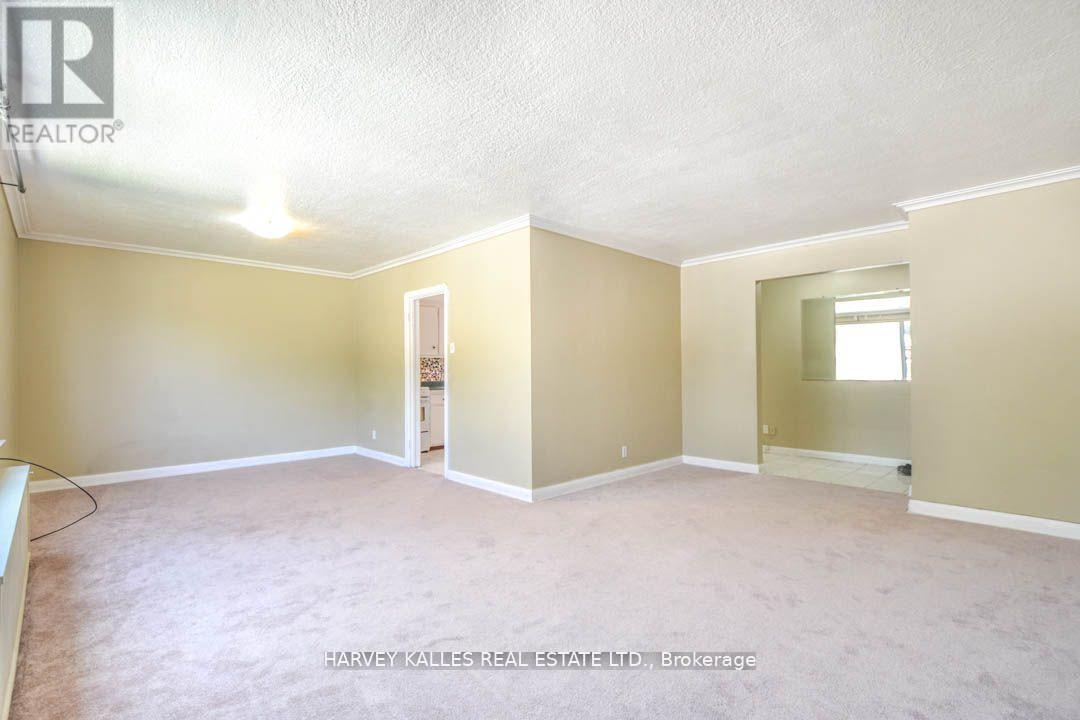 90 Trethewey Drive, Toronto (Beechborough-Greenbrook), Ontario  M6M 4B4 - Photo 2 - W12501900