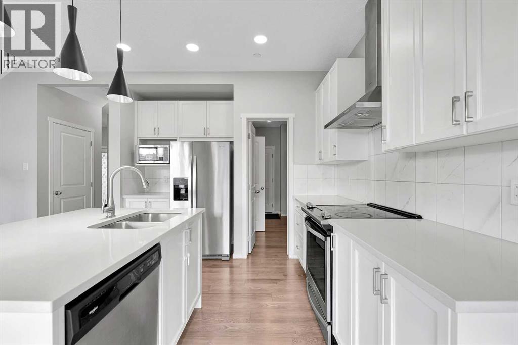 106 Lucas Crescent Nw, Calgary, Alberta  T3P 1M6 - Photo 12 - A2263068