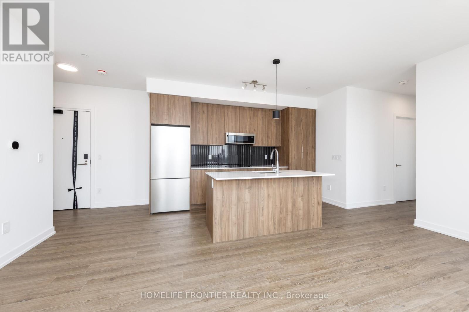 611 - 2501 Saw Whet Boulevard, Oakville, Ontario  L6M 5N2 - Photo 2 - W12502286