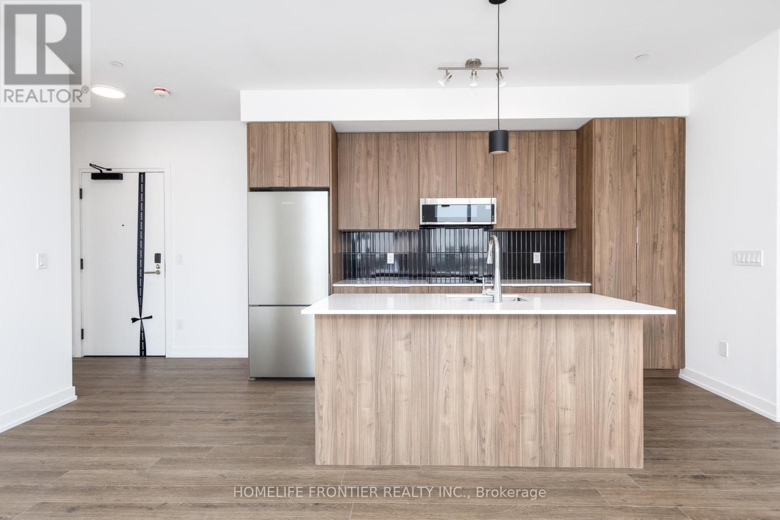 611 - 2501 Saw Whet Boulevard, Oakville, Ontario  L6M 5N2 - Photo 3 - W12502286