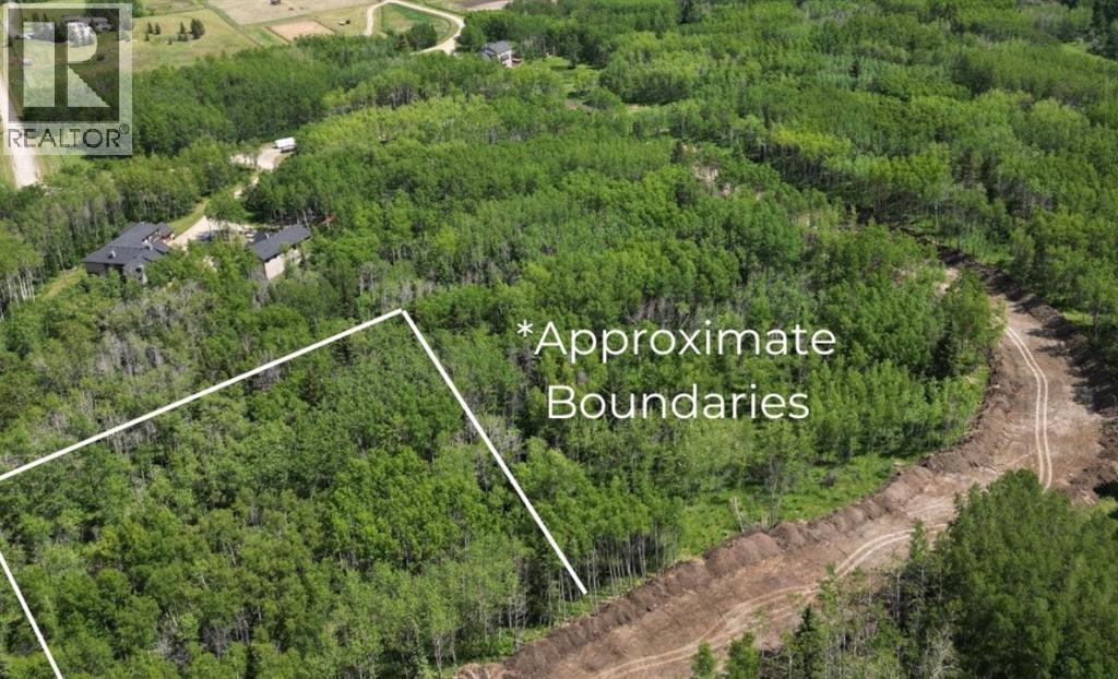 52 Elkstone Way, Rural Rocky View County, Alberta  T4C 2Y8 - Photo 1 - A2236073