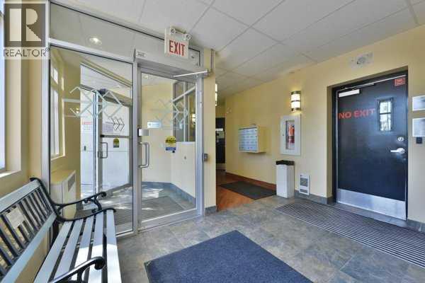 202, 5917 1a Street Sw, Calgary, Alberta  T2H 0G4 - Photo 2 - A2255520