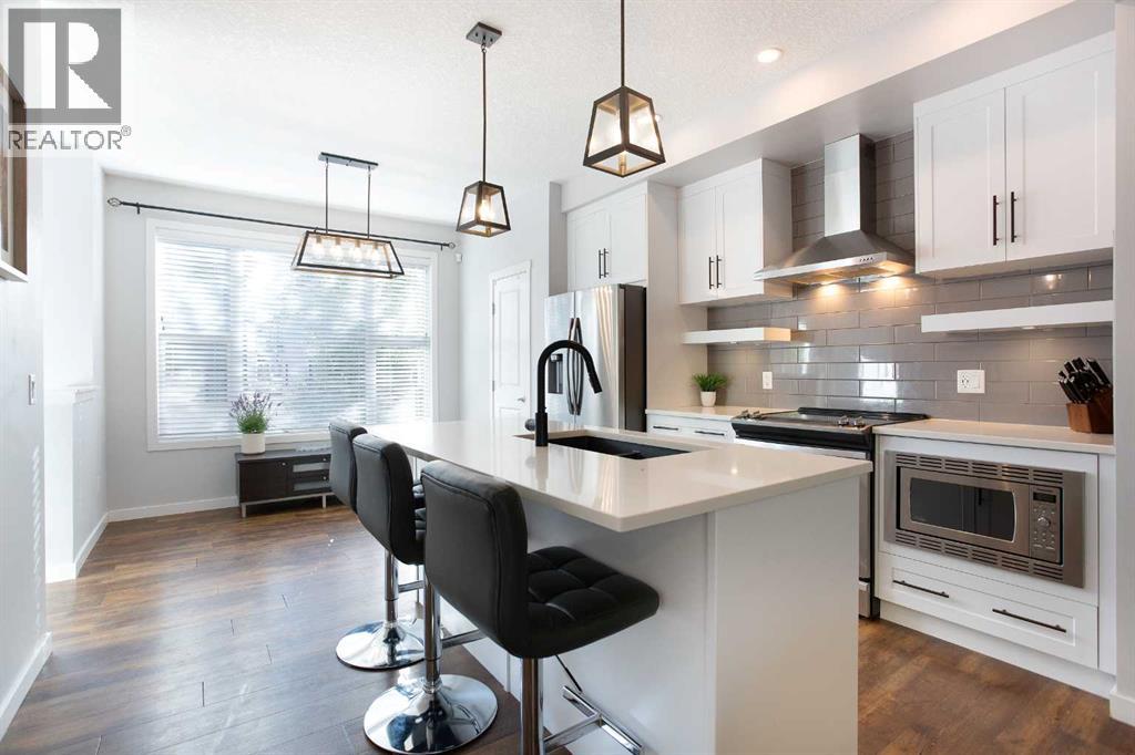 1823 Baywater Drive Sw, Airdrie, Alberta  T4B 4H2 - Photo 7 - A2265811