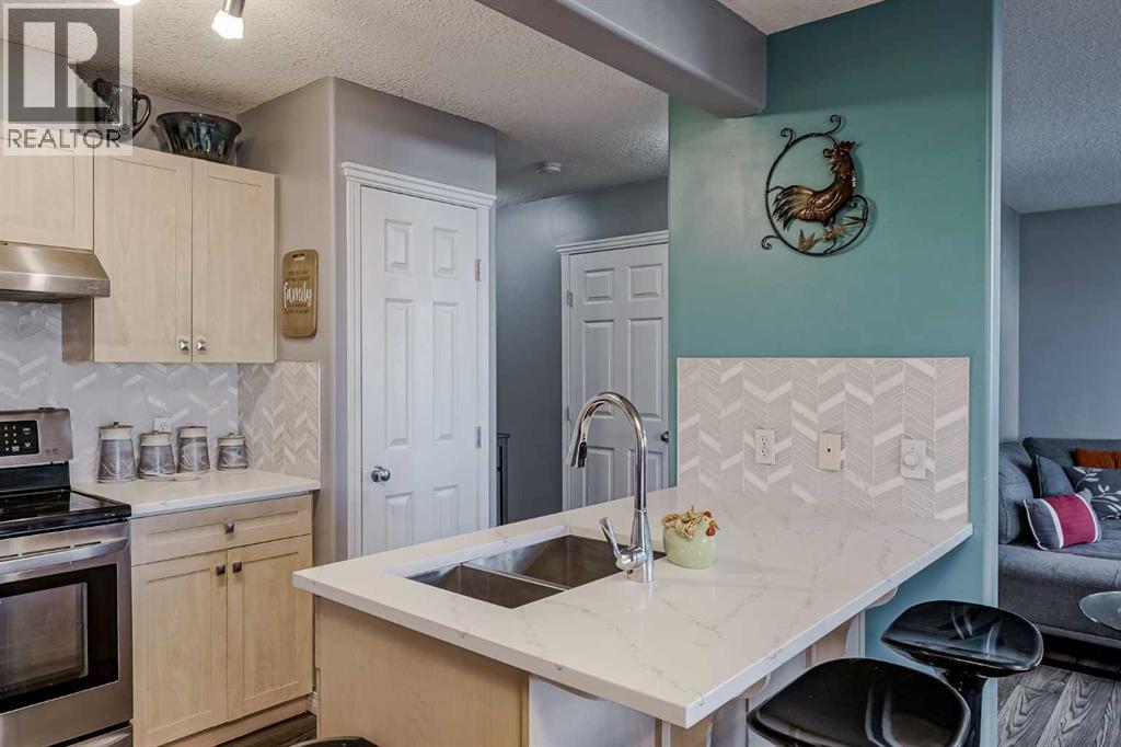 7, 102 Canoe Square Sw, Airdrie, Alberta  T4B 2Z1 - Photo 6 - A2264070