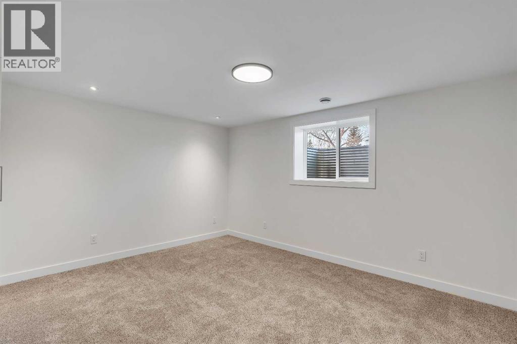 10704 Oakfield Drive Sw, Calgary, Alberta T2W 2C9 - Photo 33 - A2242097