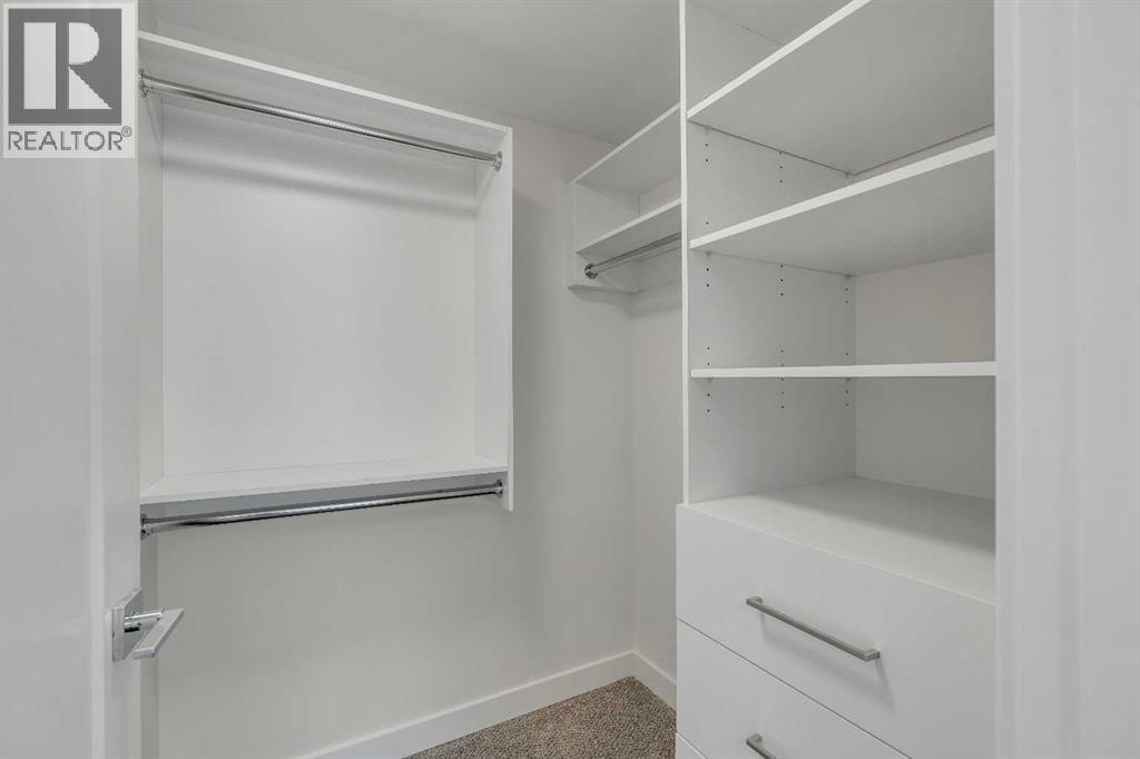 10704 Oakfield Drive Sw, Calgary, Alberta T2W 2C9 - Photo 30 - A2242097