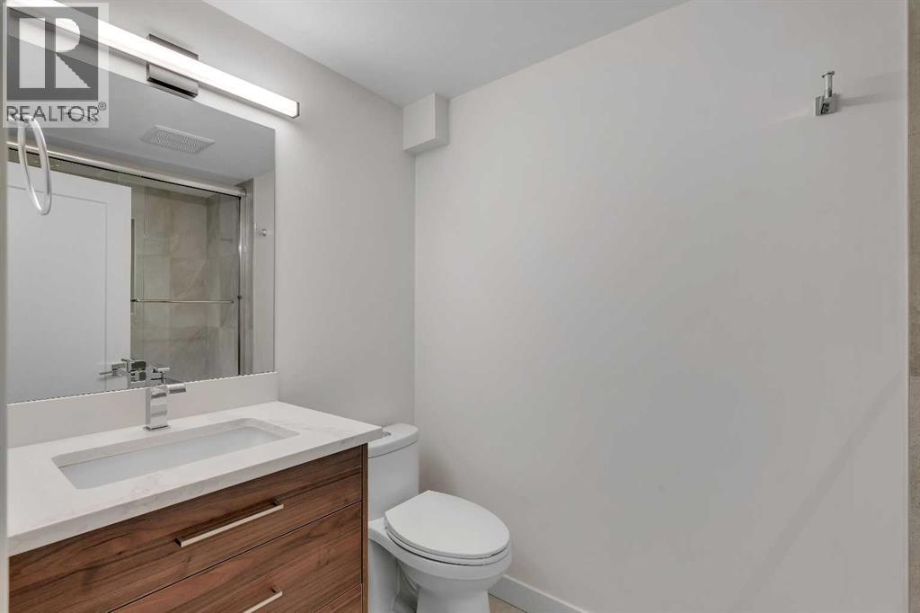 10704 Oakfield Drive Sw, Calgary, Alberta T2W 2C9 - Photo 31 - A2242097