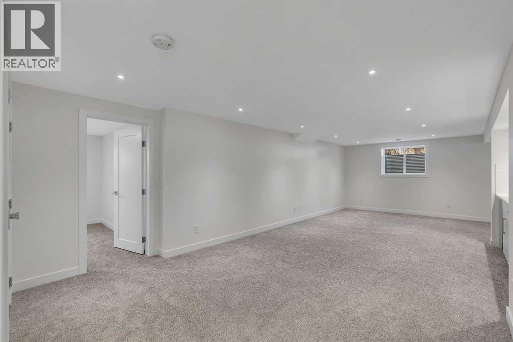 10704 Oakfield Drive Sw, Calgary, Alberta T2W 2C9 - Photo 27 - A2242097