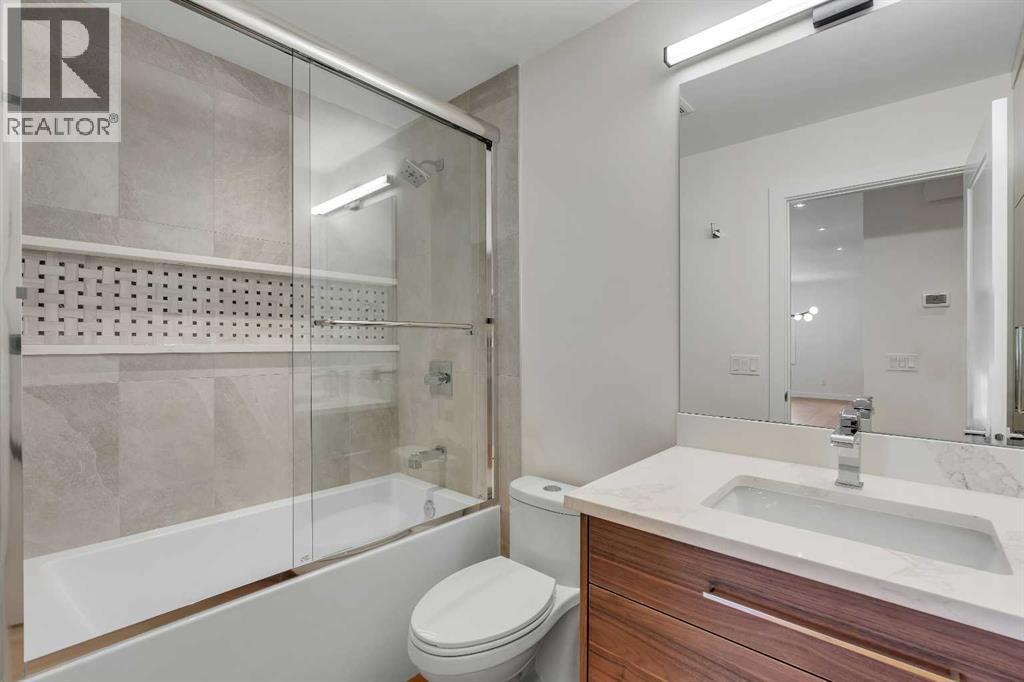 10704 Oakfield Drive Sw, Calgary, Alberta T2W 2C9 - Photo 17 - A2242097