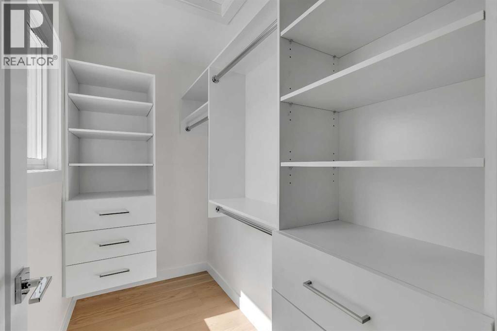 10704 Oakfield Drive Sw, Calgary, Alberta T2W 2C9 - Photo 16 - A2242097