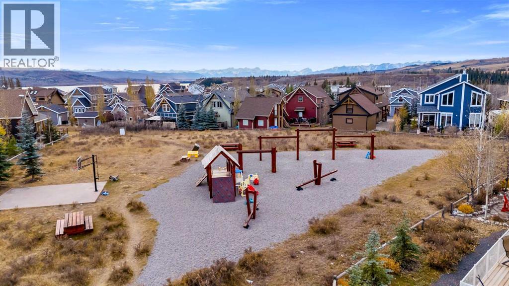 256 Cottageclub Crescent, Rural Rocky View County, Alberta  T4C 1B1 - Photo 25 - A2265981