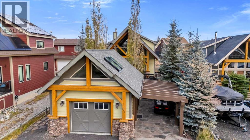 256 Cottageclub Crescent, Rural Rocky View County, Alberta  T4C 1B1 - Photo 3 - A2265981