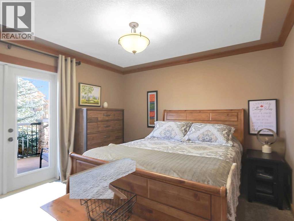 256 Cottageclub Crescent, Rural Rocky View County, Alberta  T4C 1B1 - Photo 14 - A2265981