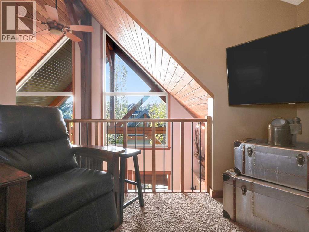 256 Cottageclub Crescent, Rural Rocky View County, Alberta  T4C 1B1 - Photo 18 - A2265981