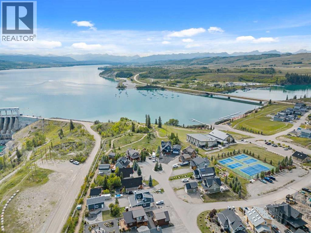 256 Cottageclub Crescent, Rural Rocky View County, Alberta  T4C 1B1 - Photo 36 - A2265981