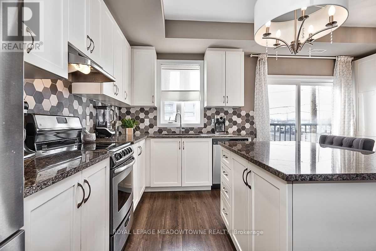 23 - 70 Plains Road W, Burlington, Ontario  L7T 0B6 - Photo 2 - W12503070