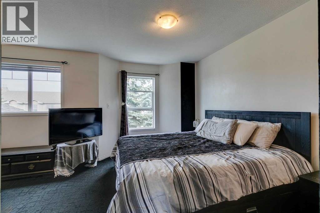 51 Spring Meadows Bay, Okotoks, Alberta  T1S 2G8 - Photo 15 - A2259710