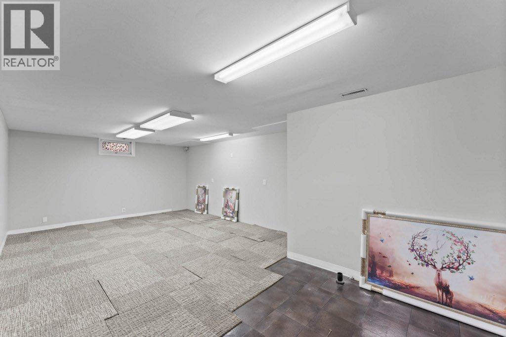 47 Woodmont Way Sw, Calgary, Alberta  T2W 4L7 - Photo 32 - A2260483