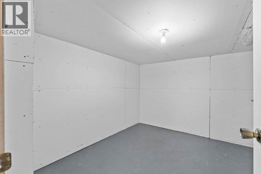 47 Woodmont Way Sw, Calgary, Alberta  T2W 4L7 - Photo 35 - A2260483