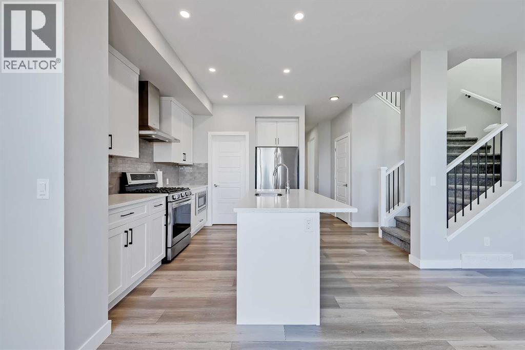 78 Larkspur Bend, Okotoks, Alberta  T1S 4E6 - Photo 4 - A2267425