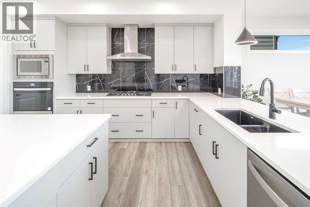 834 Alpine Drive Sw, Calgary, Alberta  T2Y 0S4 - Photo 6 - A2266361