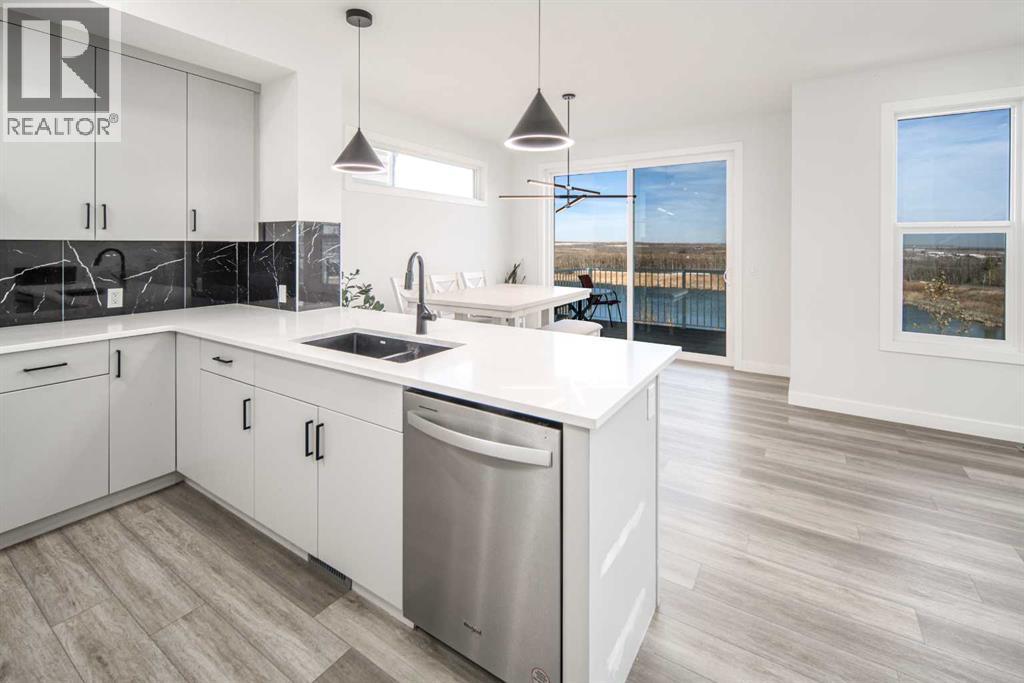 834 Alpine Drive Sw, Calgary, Alberta  T2Y 0S4 - Photo 5 - A2266361