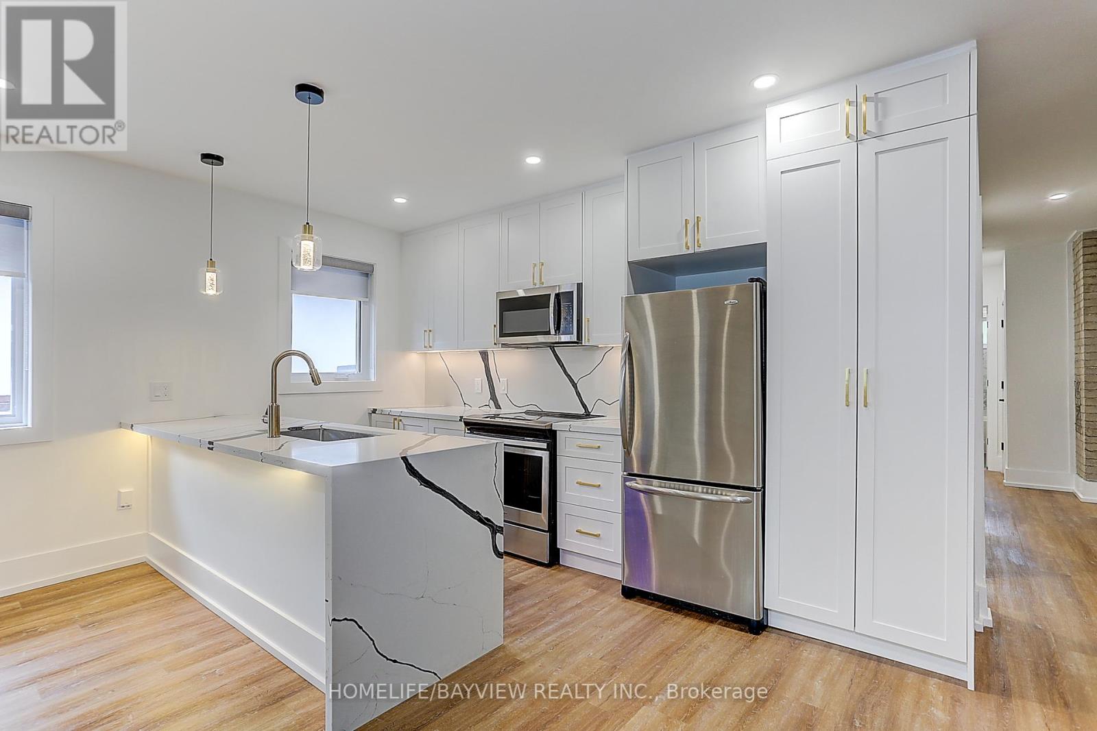 Upper - 43 Wineva Avenue, Toronto, Ontario  M4E 2T1 - Photo 13 - E12503596