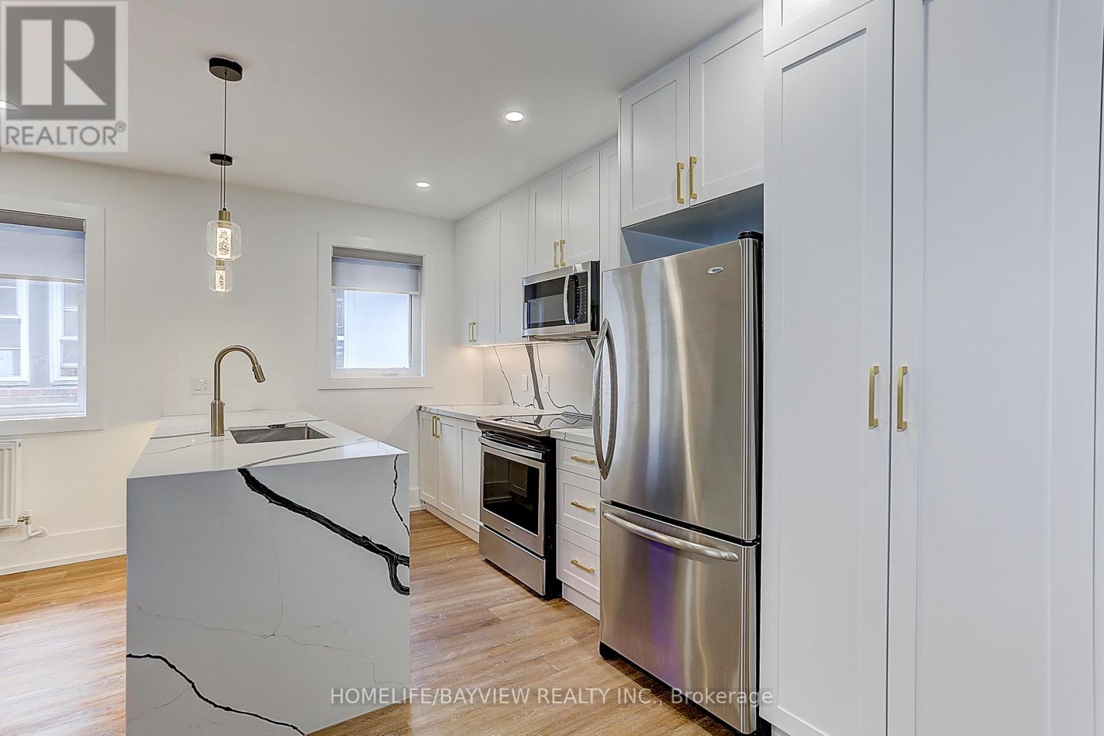 Upper - 43 Wineva Avenue, Toronto, Ontario  M4E 2T1 - Photo 14 - E12503596