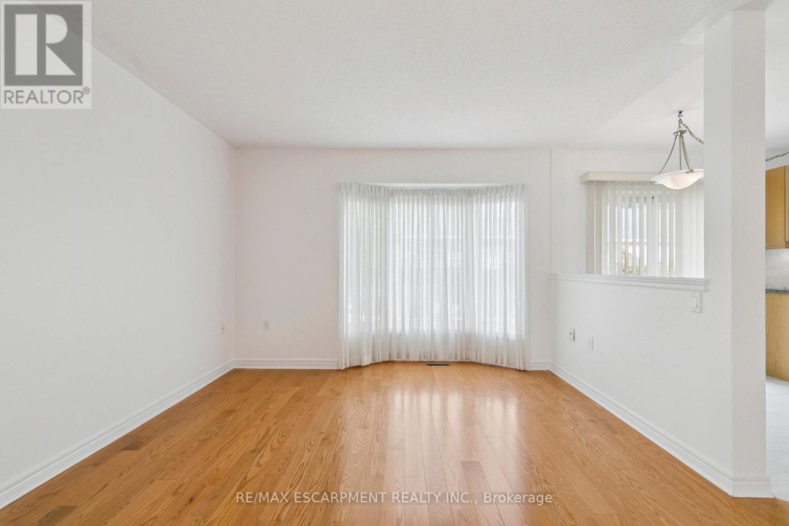 245 Centennial Forest Drive, Milton, Ontario  L9T 5W9 - Photo 7 - W12453891